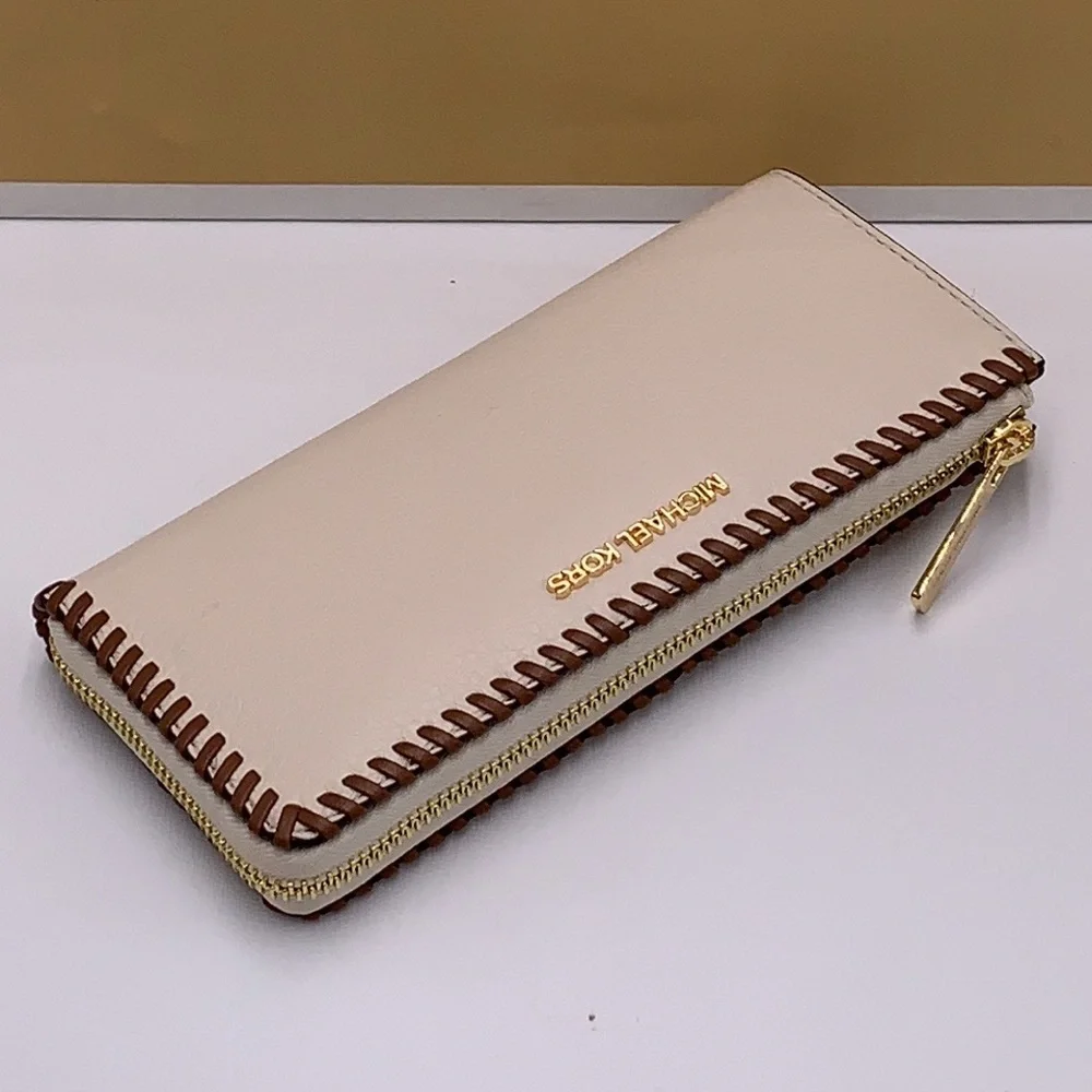 MICHAEL KORS JET SET TRAVEL LARGE THREE QUARTER ZIP WALLET LIGHT CREAM MULTI